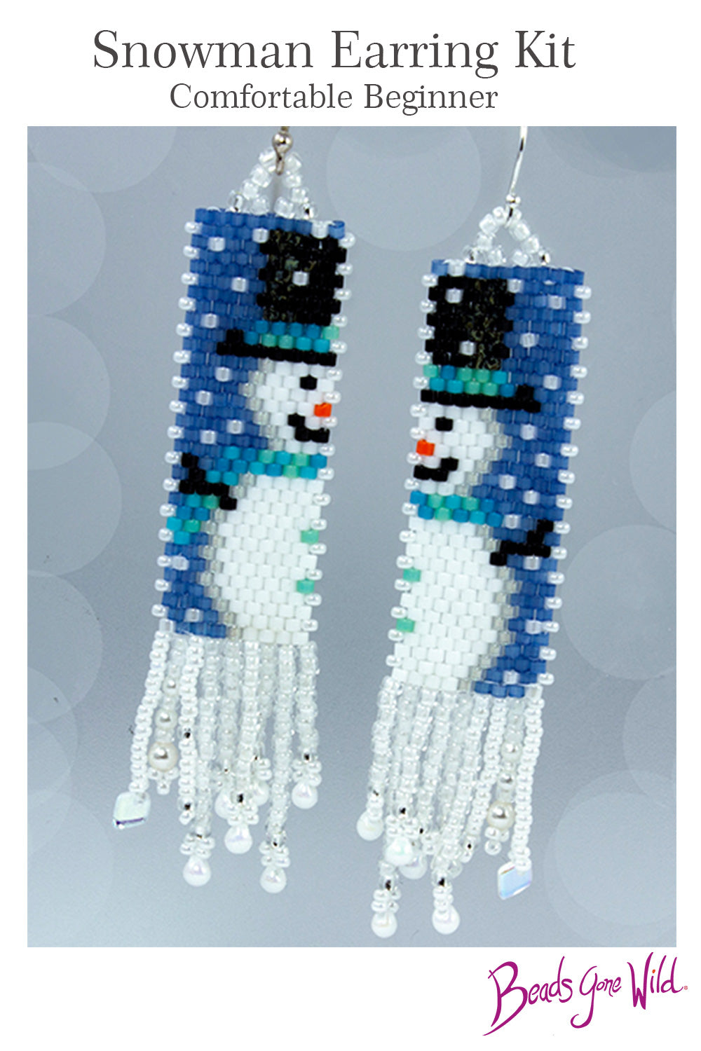 Close-up of Snowman Earring Kit components: beads, thread, needles, sterling ear wires, and instruction charts for peyote stitch.