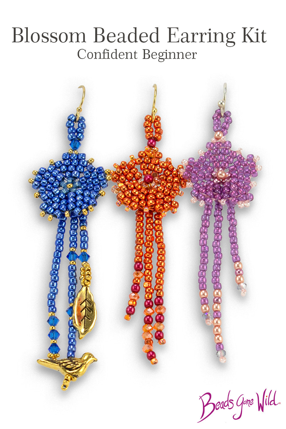 Beaded earrings in three colorways — blue with long blue fringe and gold charms, orange with multi-color fringe, and pink-lavender with pearl-accented fringe. Each earring features a circular beaded flower with fringe extending from behind the center.